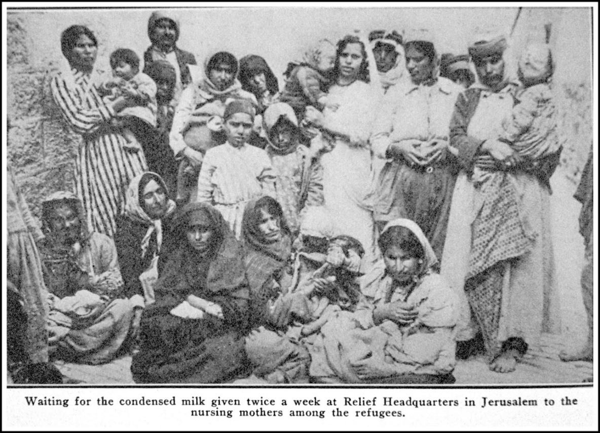 A picture containing text, posing, old, group
Description automatically generated