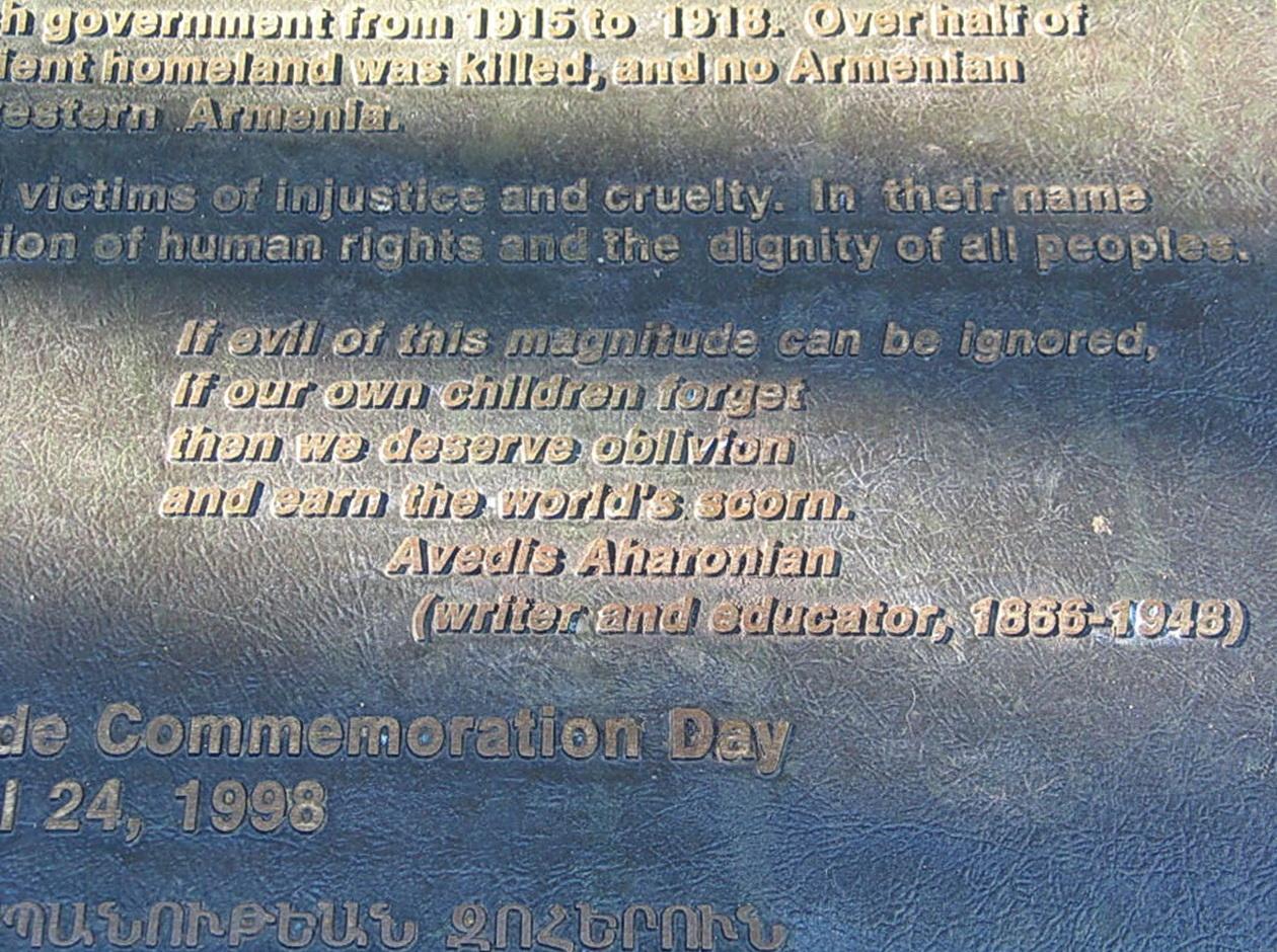 A picture containing text, plaque

Description automatically generated